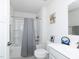 Clean bathroom with a shower, toilet, and modern vanity at 8630 Kenridge Ln, Fuquay Varina, NC 27526