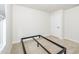 A carpeted bedroom with a modern window and baseboard molding at 8630 Kenridge Ln, Fuquay Varina, NC 27526