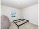 Bedroom with a carpet floor, a modern beanbag chair, and a window at 8630 Kenridge Ln, Fuquay Varina, NC 27526
