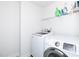 Functional laundry room with modern appliances and ample storage space at 8630 Kenridge Ln, Fuquay Varina, NC 27526