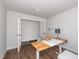 Spacious home office with hardwood floors, a modern desk, and ample natural light at 8630 Kenridge Ln, Fuquay Varina, NC 27526