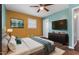 Cozy main bedroom featuring a comfortable bed, stylish furniture, and ample natural light at 902 Long Ave, Garner, NC 27529