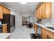 Modern kitchen with stainless steel appliances, stylish countertops, and ample cabinet space at 902 Loop Rd, Clayton, NC 27527