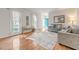 Bright living room with hardwood floors, neutral paint, and lots of natural light at 902 Loop Rd, Clayton, NC 27527