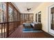 Spacious screened-in porch perfect for relaxing, complete with comfortable seating and ceiling fan at 902 Loop Rd, Clayton, NC 27527