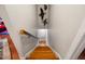 Wooden staircase descends into the house, providing access to multiple floors and views at 902 Loop Rd, Clayton, NC 27527