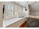 Charming window seat with storage and natural light accents this versatile living space at 902 Loop Rd, Clayton, NC 27527