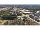 Aerial view of a community with various fields, apartments, and recreational areas at 992 Ambergate, Apex, NC 27502