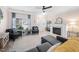 Open-concept living room offering comfortable seating, natural lighting, and decorative fireplace at 992 Ambergate, Apex, NC 27502