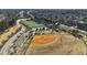 Aerial view of community baseball and soccer fields, as well as a parking lot at 992 Ambergate, Apex, NC 27502