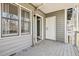 Private deck or patio offers additional outdoor living space at 100 Hunting Chase # 1-B, Cary, NC 27513