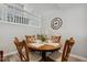 Cozy dining area featuring a round table with seating for six and stylish decor at 100 Hunting Chase # 1-B, Cary, NC 27513