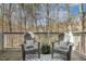 Deck with views of wooded area and neutral furniture and decor at 100 Hunting Chase # 1-B, Cary, NC 27513