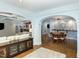 Basement space with stylish furniture and an adjacent seating/dining area at 10841 Round Brook Cir, Raleigh, NC 27617
