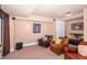 This home theater features comfortable leather chairs, a projector, and a large screen at 10841 Round Brook Cir, Raleigh, NC 27617