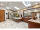 Luxurious bathroom with soaking tub, dual vanities, mosaic tile accents, and natural light from skylights at 12117 Cliffside Cir, Raleigh, NC 27614