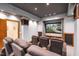Enjoy movies in this home theater with tiered seating and a large screen at 12117 Cliffside Cir, Raleigh, NC 27614