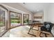 Bright office space with large windows offering wooded views and plenty of natural light at 12117 Cliffside Cir, Raleigh, NC 27614