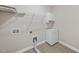 Functional laundry room with sink, cabinet and plenty of space for all your laundry needs at 1212 Stonemill Falls Dr, Wake Forest, NC 27587