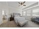 Spacious main bedroom featuring a trey ceiling, ensuite bath, and neutral decor at 1212 Stonemill Falls Dr, Wake Forest, NC 27587