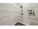 Walk-in pantry featuring wire shelving for ample storage at 1212 Stonemill Falls Dr, Wake Forest, NC 27587