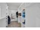 Spacious walk-in closet with ample shelving and a mirror, providing organized storage solutions at 1212 Stonemill Falls Dr, Wake Forest, NC 27587