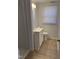 Bright bathroom features a modern white vanity and updated fixtures at 123 Barclay Rd, Chapel Hill, NC 27516