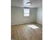 Bright room offering new floors and fresh neutral paint, with ample light at 123 Barclay Rd, Chapel Hill, NC 27516