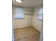 Cozy bedroom features new floors, ample natural light and built-in shelving at 123 Barclay Rd, Chapel Hill, NC 27516