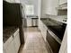 Clean kitchen featuring granite countertops and stainless steel appliances at 123 Barclay Rd, Chapel Hill, NC 27516