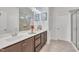 Bathroom featuring double sink vanity with granite countertops and a separate glass enclosed shower at 123 Carbone Ln, Clayton, NC 27527