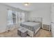 Calm bedroom featuring neutral colors, natural light, and cozy accents and furniture at 123 Carbone Ln, Clayton, NC 27527