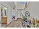 Bright foyer with hardwood floors, elegant decor, and a staircase leading to the upper level of the home at 123 Carbone Ln, Clayton, NC 27527