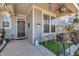 Inviting front porch with seating, decorative plants, and charming accents, creating a cozy outdoor space at 123 Carbone Ln, Clayton, NC 27527
