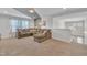 Large living room with a huge comfy sectional, neutral walls, and ample natural light at 123 Carbone Ln, Clayton, NC 27527