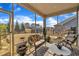 A screened-in porch has seating, potted plants, and views of the backyard at 123 Carbone Ln, Clayton, NC 27527