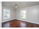 Bedroom with hardwood floors, neutral color scheme and abundant natural light at 1239 Brogden Rd, Smithfield, NC 27577