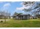 Cozy single-Gathering home with a covered carport and a lush green lawn under a partly cloudy sky at 1239 Brogden Rd, Smithfield, NC 27577