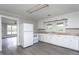 Functional kitchen equipped with white appliances, plenty of cabinet space, and durable countertops at 1239 Brogden Rd, Smithfield, NC 27577