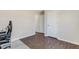 A second view of this bedroom showing three doors on the opposite wall at 131 Woodglen Dr, Clayton, NC 27527
