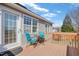 Cozy patio with a table and two chairs, perfect for outdoor relaxation at 131 Woodglen Dr, Clayton, NC 27527
