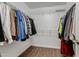 Walk-in closet includes rods and wire shelving for clothing and accessories storage at 131 Woodglen Dr, Clayton, NC 27527
