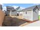 An angle of the backyard displaying the house with a small storage shed at 1312 Big Falls Dr, Wendell, NC 27591