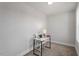 Bright, minimalist office space with a desk, chair, and natural light at 1312 Big Falls Dr, Wendell, NC 27591