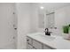 Bathroom featuring one sink, an expansive countertop, and a large mirror at 163 Periwinkle Pl, Clayton, NC 27527