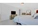 Light filled bedroom with carpet and two matching dressers at 163 Periwinkle Pl, Clayton, NC 27527