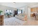 Inviting living room features a neutral color scheme, wood floors, and lots of natural light at 163 Periwinkle Pl, Clayton, NC 27527