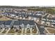 New townhome construction in a planned neighborhood with attached garages and manicured lawns at 175 Norwell Ln, Pittsboro, NC 27312