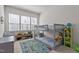 Bedroom featuring bunkbeds, a car rug, and lots of natural light at 175 Norwell Ln, Pittsboro, NC 27312