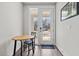 Cozy breakfast nook with sliding door leading to the front porch at 175 Norwell Ln, Pittsboro, NC 27312